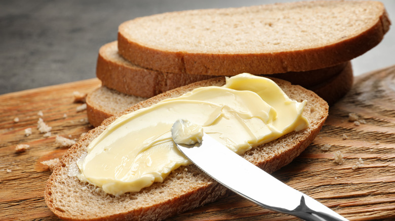 Spreading butter on breadSpreading butter on bread