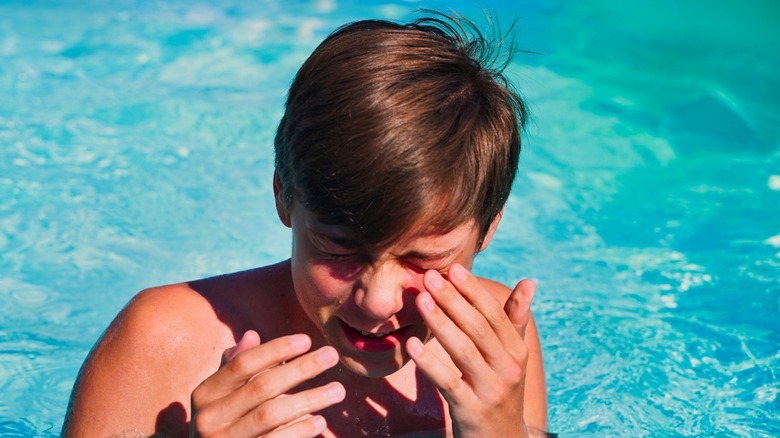 Boy in pool with allergy