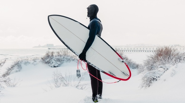 Surfer in a winter wonderland