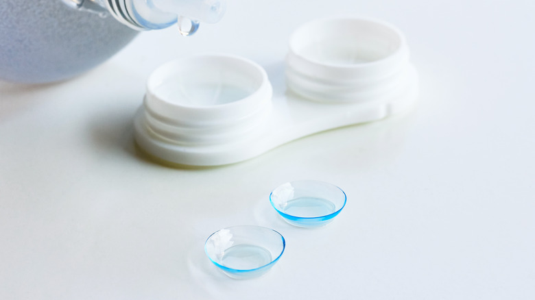 Close up of contact lenses and case