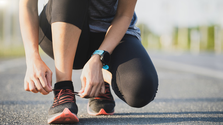 Tying shoes before a run