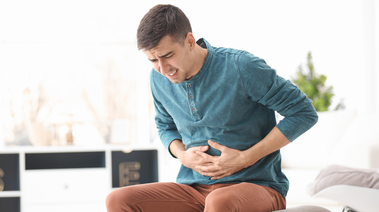 man with stomach pain