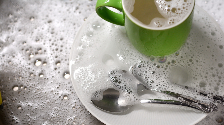 Dishes in soapy water