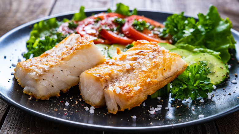 A cod filet on a table