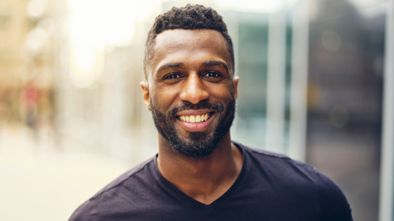 Smiling man with beard