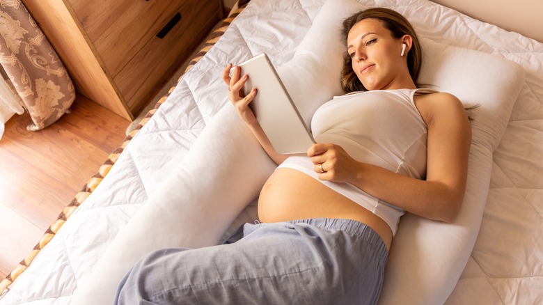 pregnant woman lying down