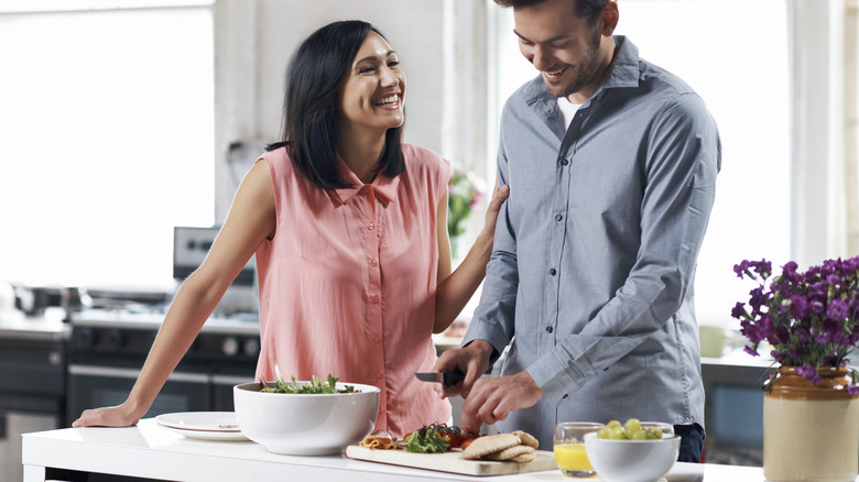 couple fixing a healthy meal