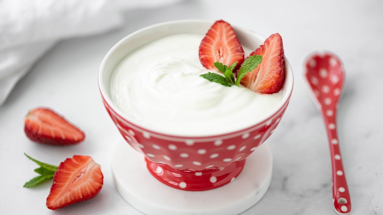 bowl of yogurt with strawberries