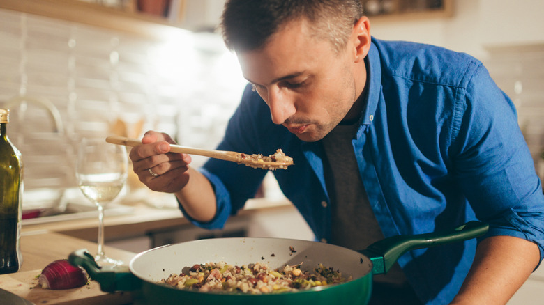Man about to taste food