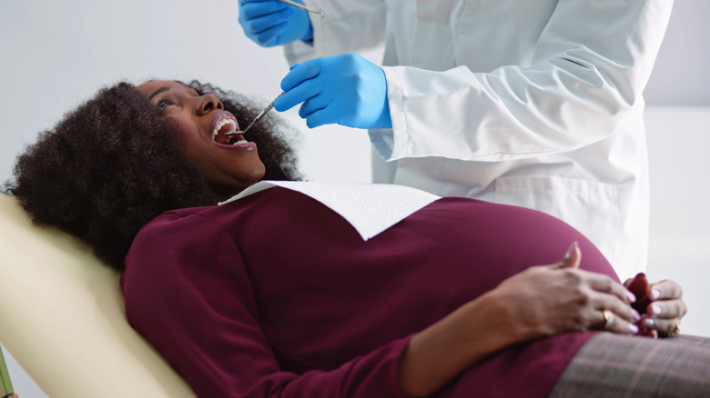 pregnant woman at dentist office