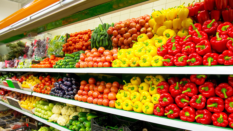 Grocery store shelf full of vegetables
