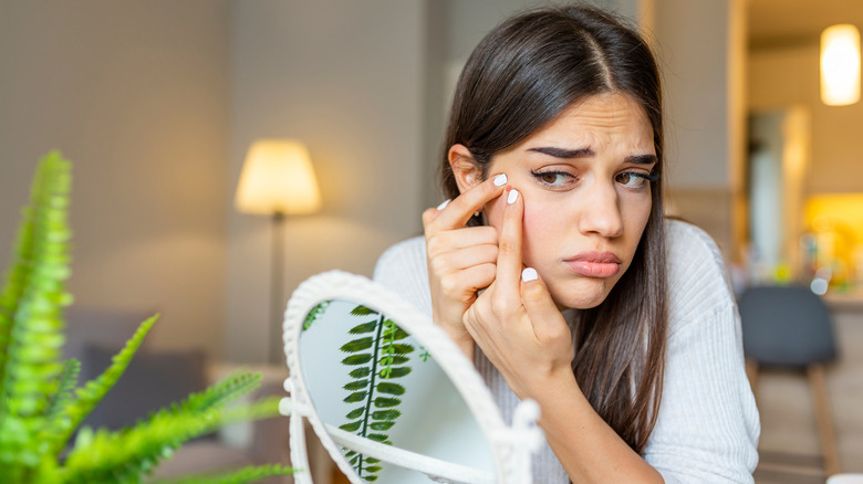 woman with acne