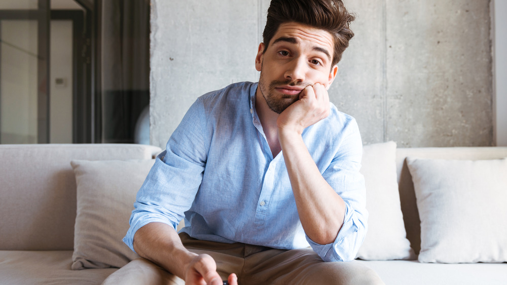 Bored man on the couch
