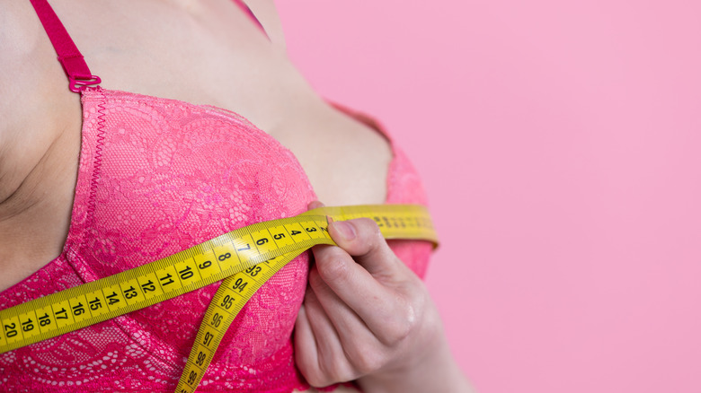 Measuring tape around bra
