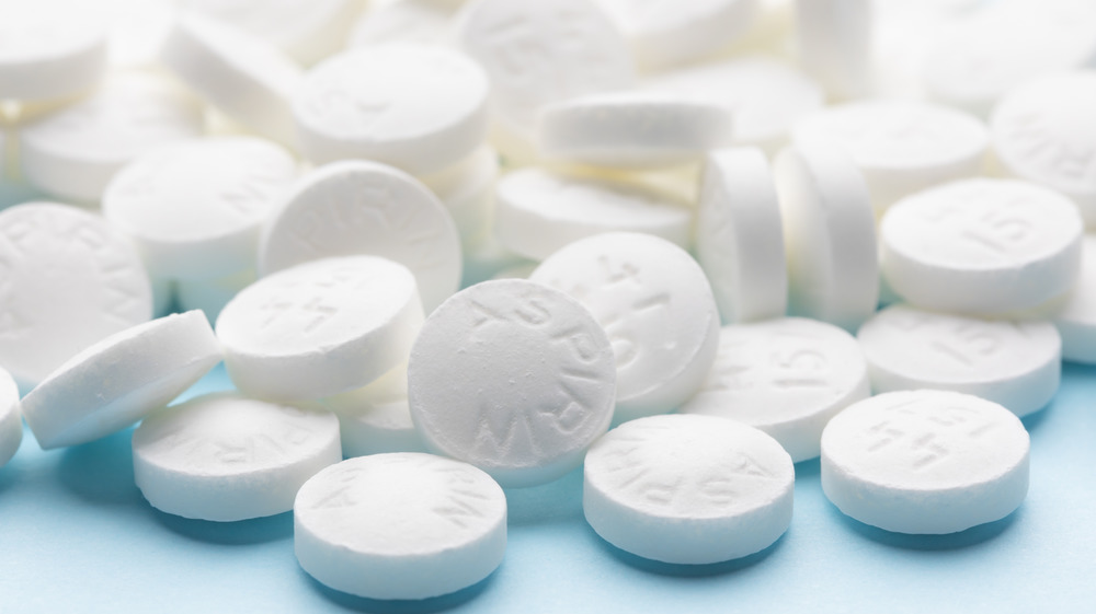 Close up of white aspirin pills