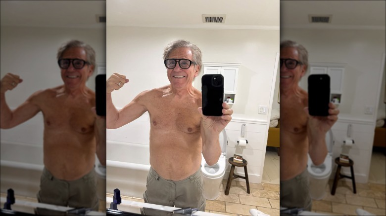 Anson Williams taking a mirror selfie shirtless